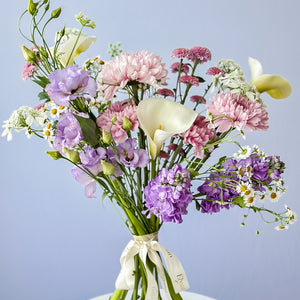 perfect mix of purple and lavander local seasonal blooms