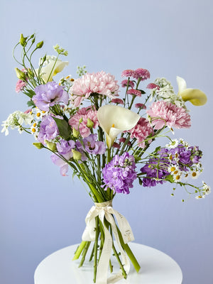 perfect mix of purple and lavander local seasonal blooms