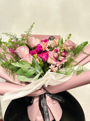 Bouquet of flowers of mix of flowers with rose, carnations and alstromelias