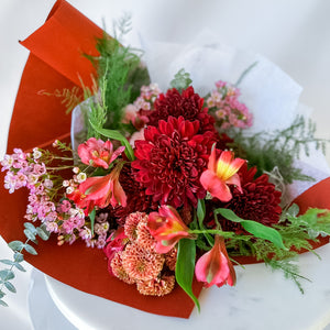 Mix of curated red and pink blooms 
