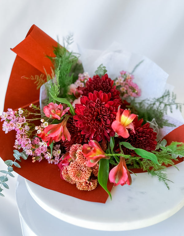 Mix of curated red and pink blooms 